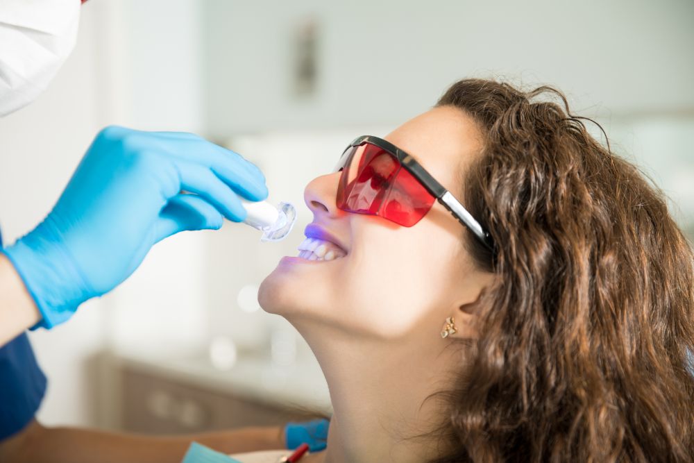 woman undergoing teeth whitening treatment