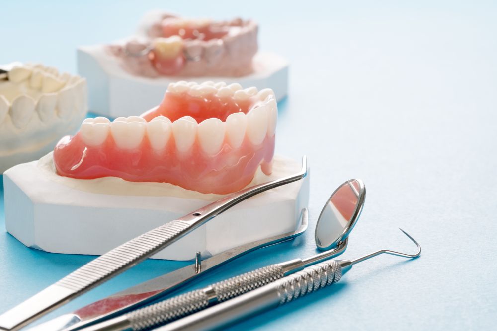 Deciding Between Dental Implants And Dentures
