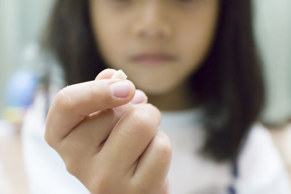 Why Pulling Your Baby’s Teeth Out May Be A Bad Idea